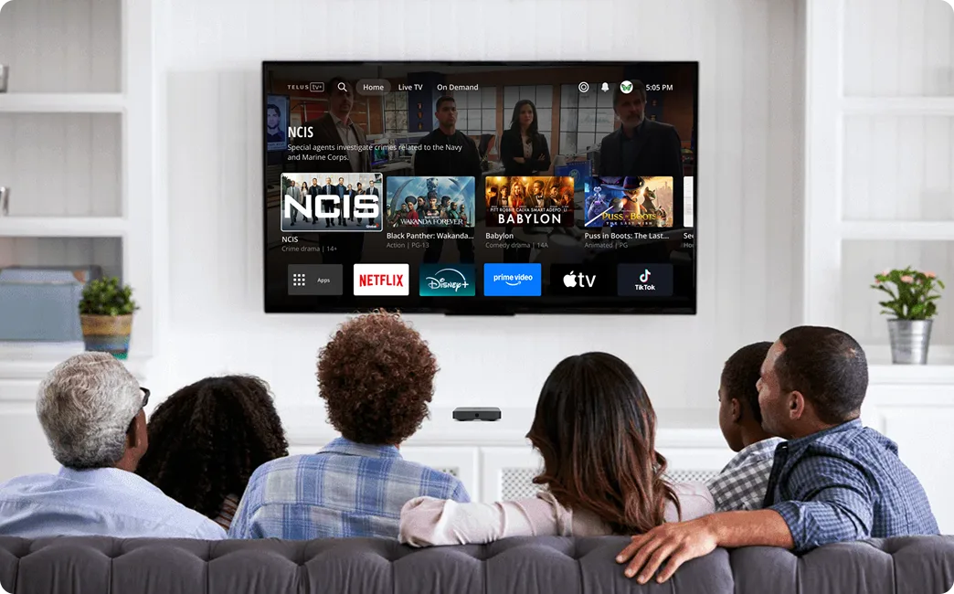 Family watching IPTV on a smart TV in a modern living room in the USA